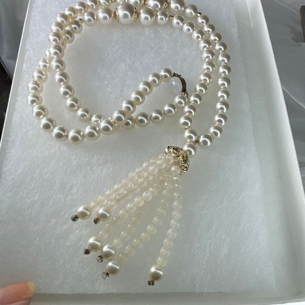 Vintage faux glass pearls 24” & beaded tassel.